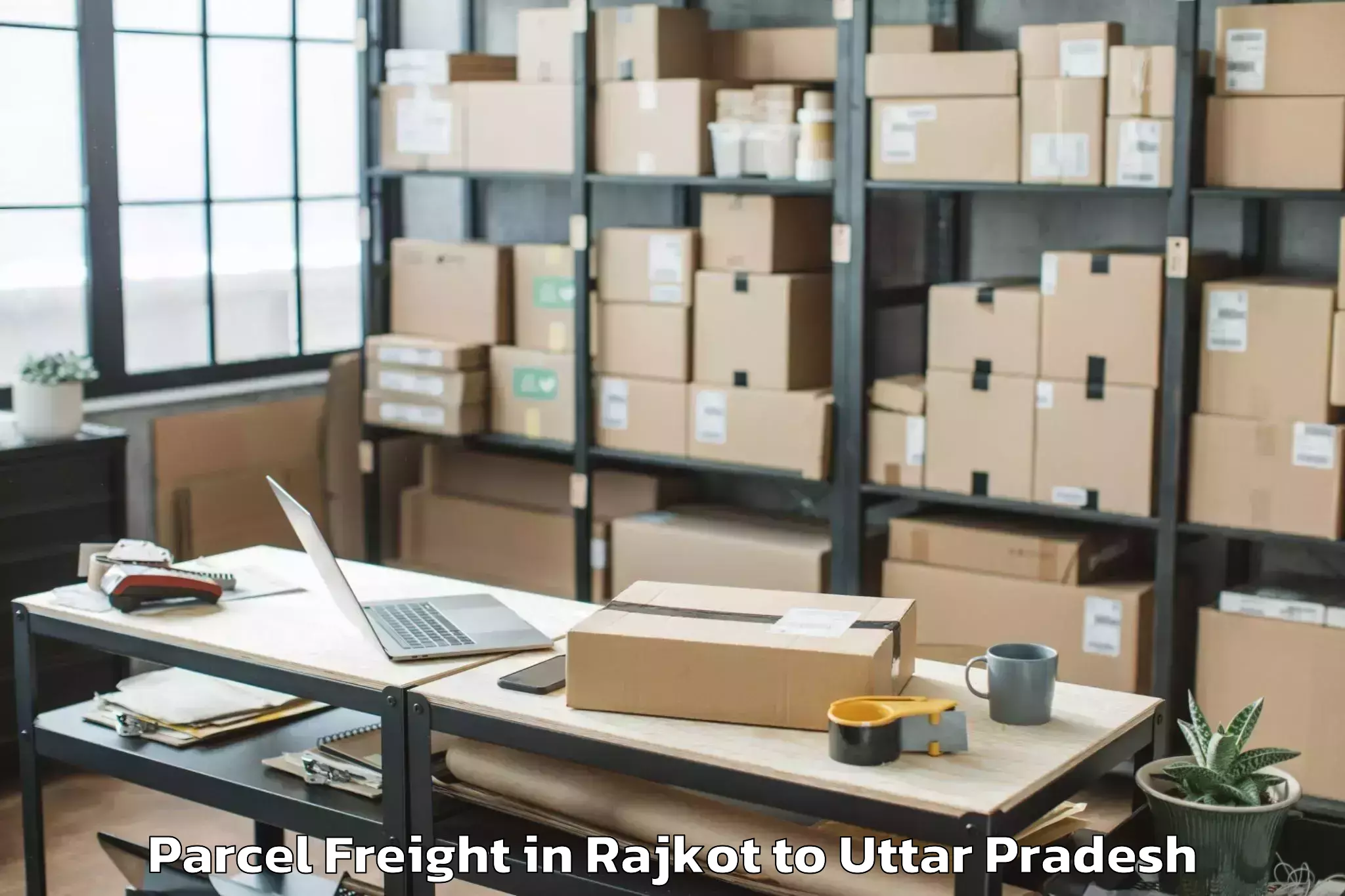 Get Rajkot to Abhilashi University Banda Parcel Freight